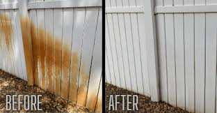 Vinyl fence before and after rust removal